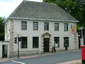 The small 2 storey Post Office is visible from across the road