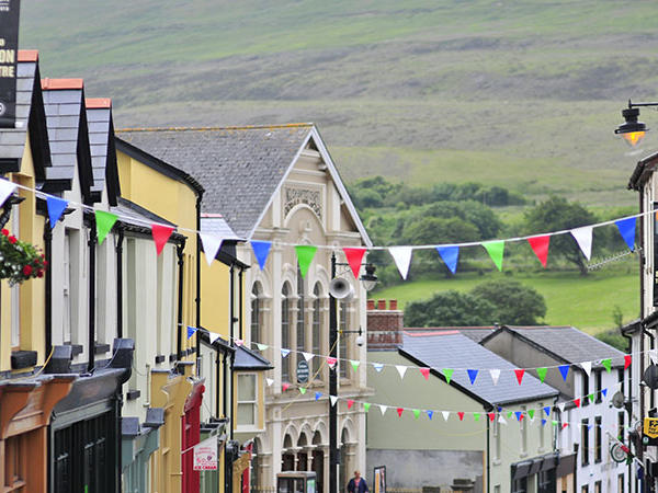 People filling the streets which have been decorated with bunting for Blaenavon Heritage Day