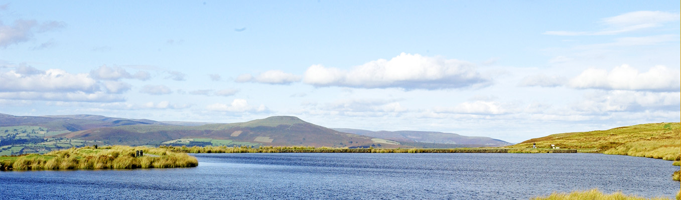 View of the Keepers Pond with the Brecon Beacons in the background