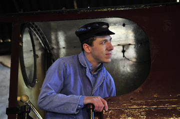 A train driver at Blaenavon Heritage Railway operating the train